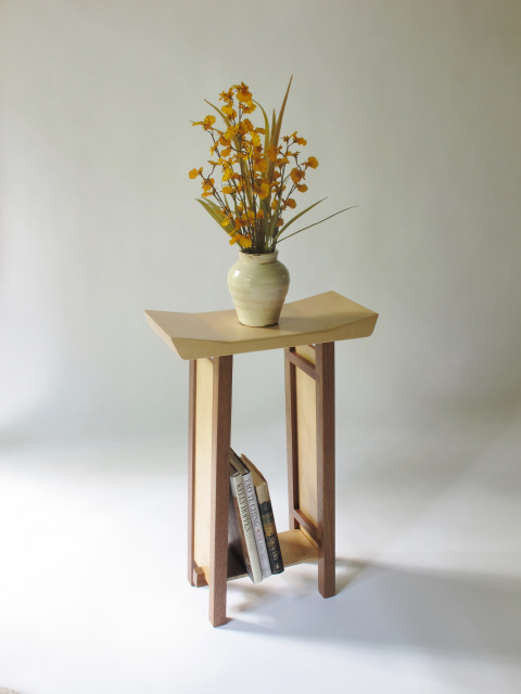 narrow modern zen side table with a hand-shaped artistic table top