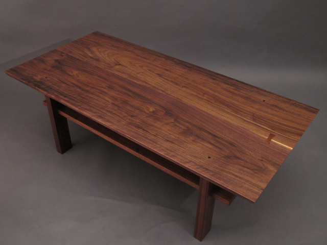 Walnut coffee table.  Artistic wood table for modern living 